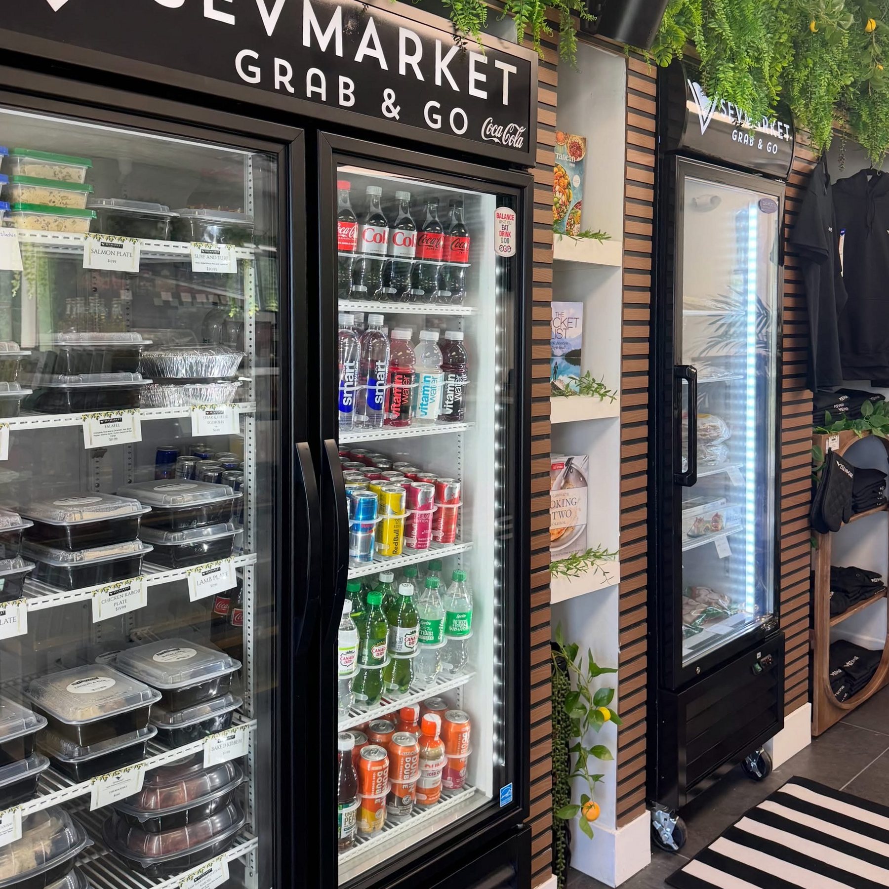 Glass fridges with prepared plates and drinks