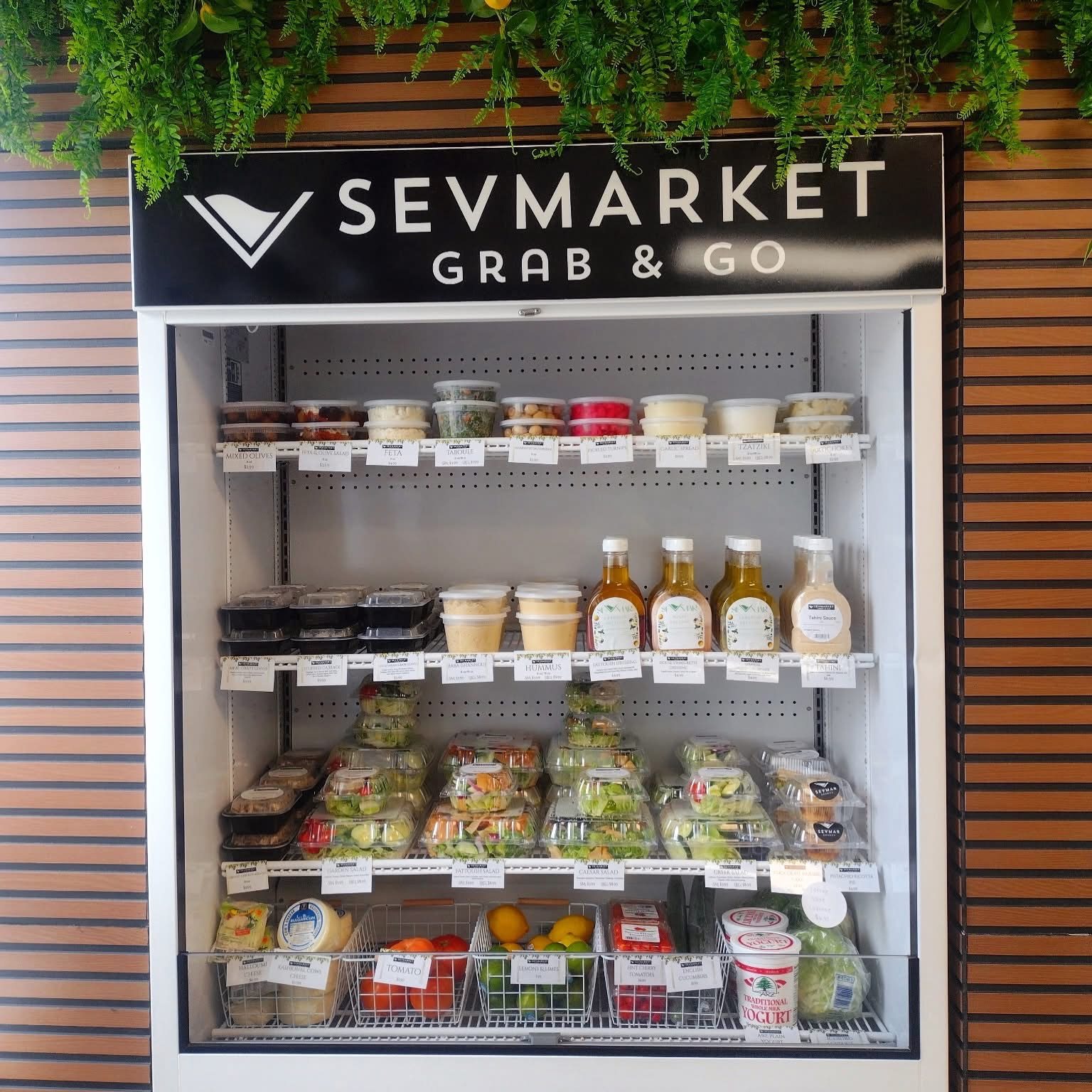 The Grab & Go fridge stocked with mezze, dips and salads